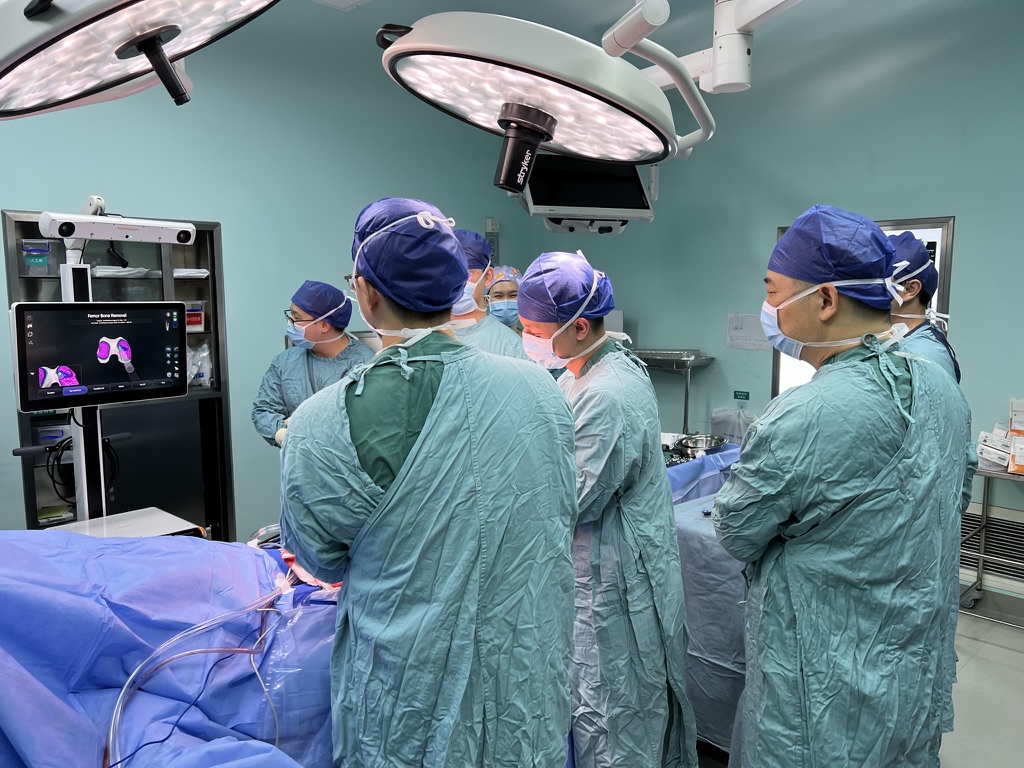 Surgical team working together in an operating theatre
